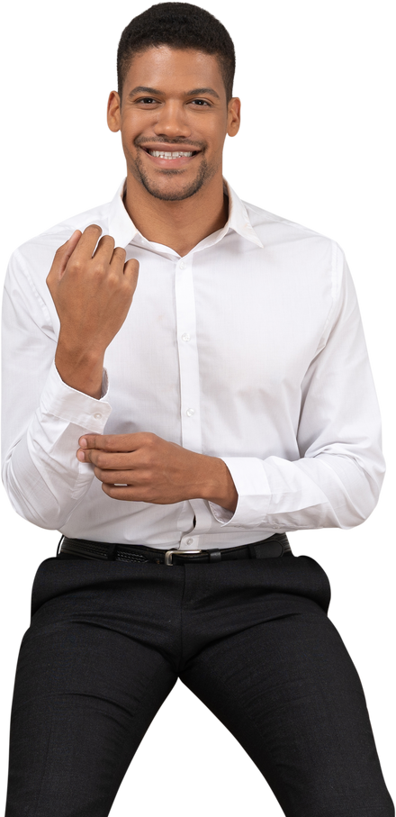 Smiling Man Holding the Cuff of His Long Sleeve Polo